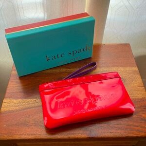 Kate Spade red patent clutch.